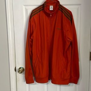 Adidas men’s warm up jacket. Orange with olive colored stripes. Size XL
